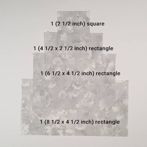 Step 2 Scottie Dog Quilt Block Pattern:
From the Fabric Y (light gray) strip cut and subcut the rectangles and square as noted in the Block Size Cutting Chart above.