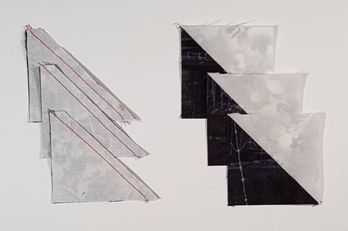 Step 3 Scottie Dog Quilt Block Pattern:
From the Fabrics X and Y cut a 2 1/2 strip. Use a half square triangle ruler to
 cut three HSTs. Stitch the HSTs. Press the seams open.