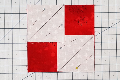 Step 4a Square in a Square: Stitch on the drawn line on the small squares. Step 4a Square in a Square: Stitch on the drawn line on the small squares.