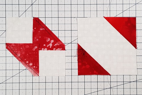 Stitch a 1/4 inch seam. Flip the corners right side up. Press the seams towards the triangles. Stitch a 1/4 inch seam. Flip the corners right side up. Press the seams towards the triangles.