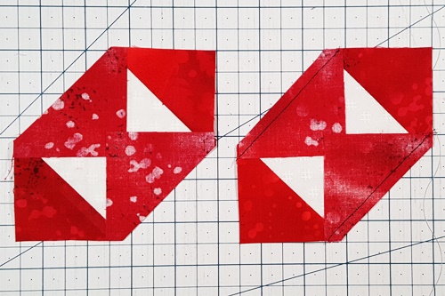 Repeat Step 2 for the remaining two corners of the large square. Stitch a 1/4 inch seam. Repeat Step 2 for the remaining two corners of the large square. Stitch a 1/4 inch seam.