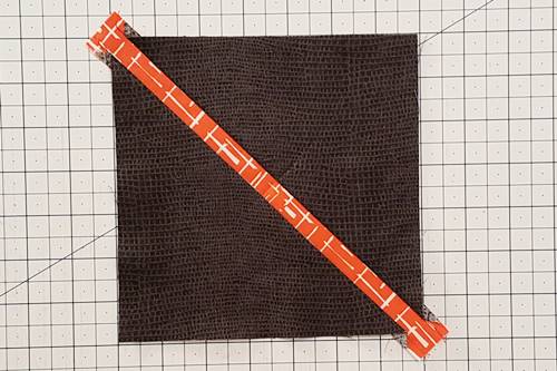 Step 11 Stem for Leaf Quilt Blocks: Fold the second triangle right side up and finger press the seam towards it. Then, press it with an iron. Step 11 Stem for Leaf Quilt Blocks: Fold the second triangle right side up and finger press the seam towards it. Then, press it with an iron.