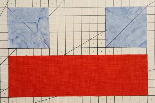 Step 1 stitch and flip squares and rectangle to make boat shape Step 1 stitch and flip squares and rectangle to make boat shape