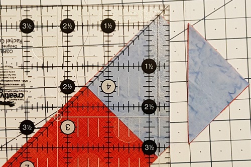 Step 5a stitch and flip: cut away the the triangle (corner) 1/4 inch away from seam. Step 5a stitch and flip: cut away the the triangle (corner) 1/4 inch away from seam.