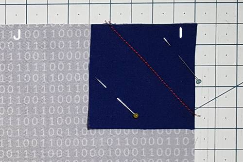 Stitch and flip: sewn line not down middle of square. Stitch and flip: sewn line not down middle of square.