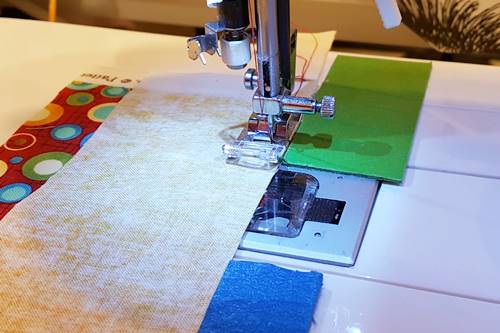 Step 2b Strip quilting: Sew the strips together using a 1/4 inch seam. Step 2b Strip quilting: Sew the strips together using a 1/4 inch seam.