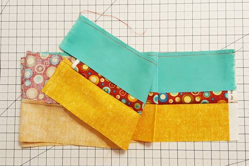 Step 2g Strip quilting: Here, you can see how both ends of the strip set work out. Step 2g Strip quilting: Here, you can see how both ends of the strip set work out.