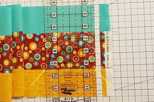 Step 4a Strip quilting: Place a horizontal measurement line of a quilting ruler along one of seam lines. Cut off the selvage edge of the strip set, making a straight edge. Step 4a Strip quilting: Place a horizontal measurement line of a quilting ruler along one of seam lines. Cut off the selvage edge of the strip set, making a straight edge.