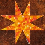 Picture of an eight pointed star known as the sun rays quilt block