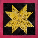 Picture of a sawtooth star quilt block