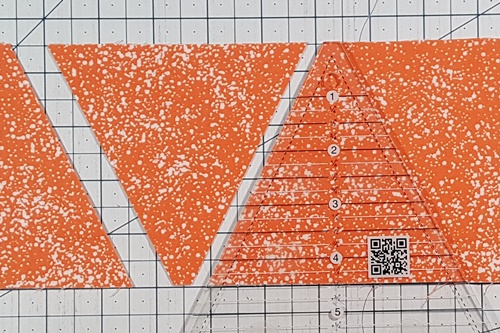Step 3 Triangle in a Square: Rotate the Tri ruler 180 degrees, align blunt tip on top edge and cut. Step 3 Triangle in a Square: Rotate the Tri ruler 180 degrees, align blunt tip on top edge and cut.