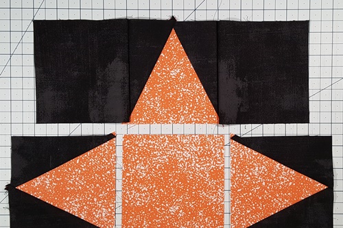 Step 7 Triangle in a Square Star: stitch together units of Row 1. Flip background square from Column 3 right side up. Row 1 is complete. Step 7 Triangle in a Square Star: stitch together units of Row 1. Flip background square from Column 3 right side up. Row 1 is complete.