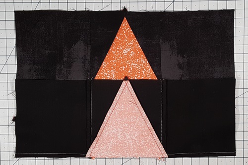 Cat Quilt Block Pattern layout after Step 9 completed. Step 10 Triangle in a Square Star: stitch Row 3 to Row 2.